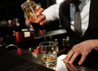 this poem is for every drunk who is sober today Close up of Barman Hands Preparing Drink