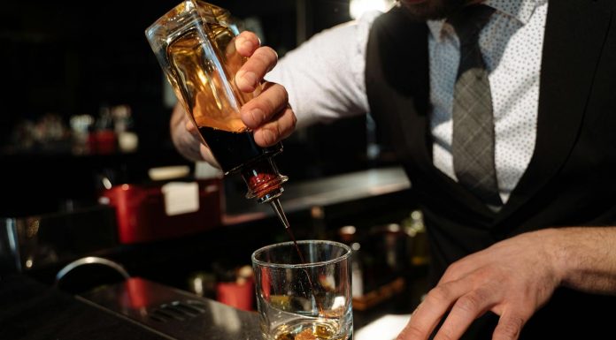 this poem is for every drunk who is sober today Close up of Barman Hands Preparing Drink