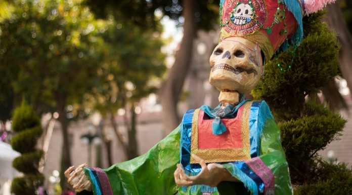 death skeleton statue near tree