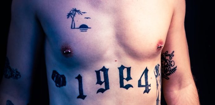 You hurt plenty topless man wearing blue and black fitted cap