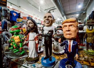 New Orleans Airport Chapel assorted bobblehead figurines inside the store