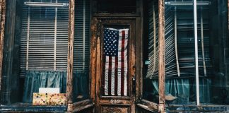 Elegy for American Democracy American flag in building