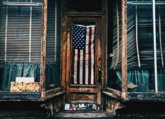 Elegy for American Democracy American flag in building