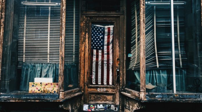 Elegy for American Democracy American flag in building