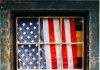 The Hurt Vote United States of America flag on window pane