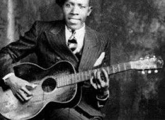 Robert Johnson in South Rosedale, Mississippi, crossroads of Highways 1 & 8 – 1921