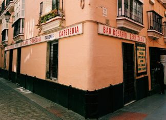 Did we meet on Matchmakers.com? person standing near white painted building