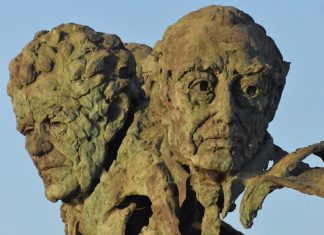 The intimacy of others A statue of a man holding a plant in his hands