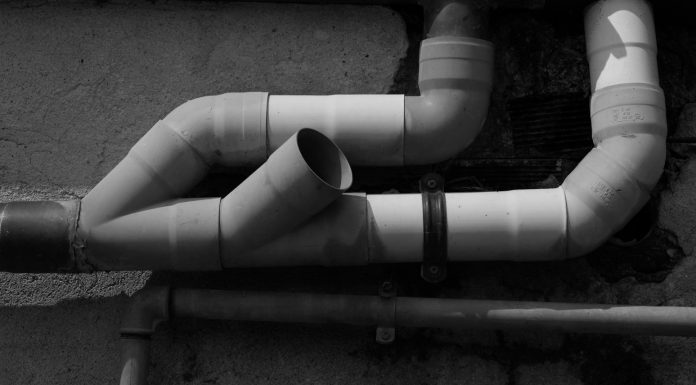 Thinkers A black and white photo of a pipe